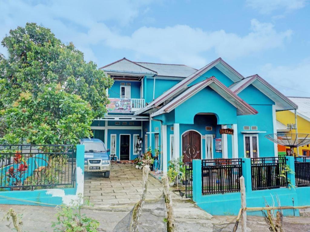 Homestay Zahra Syariah Gunung Dempo Mitra Reddoorz Lahat Luaran gambar